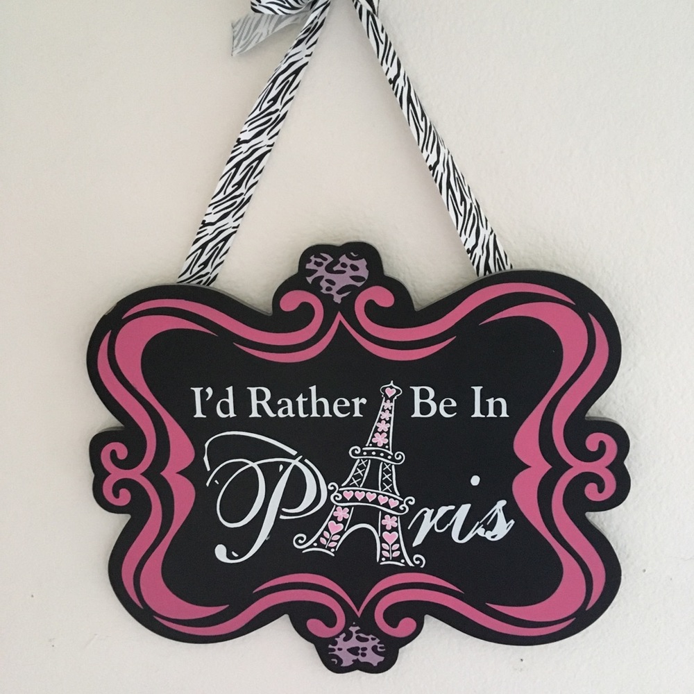 Black and pink “I’d rather be in Paris” sign